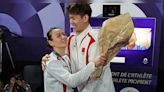 Watch: Zheng Si Wei proposes to Huang Ya Qiong after winning gold medal in badminton mixed doubles - CNBC TV18