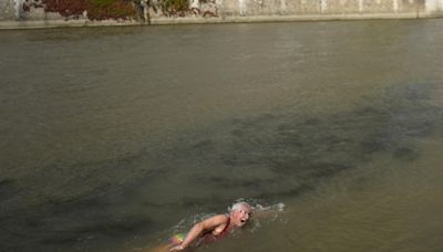 France's sports minister takes dip in Seine in boost for Olympics organisers