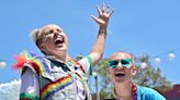 JoJo Siwa went to her first Pride parade, and her girlfriend adorably surprised her by showing up after saying she couldn't make it