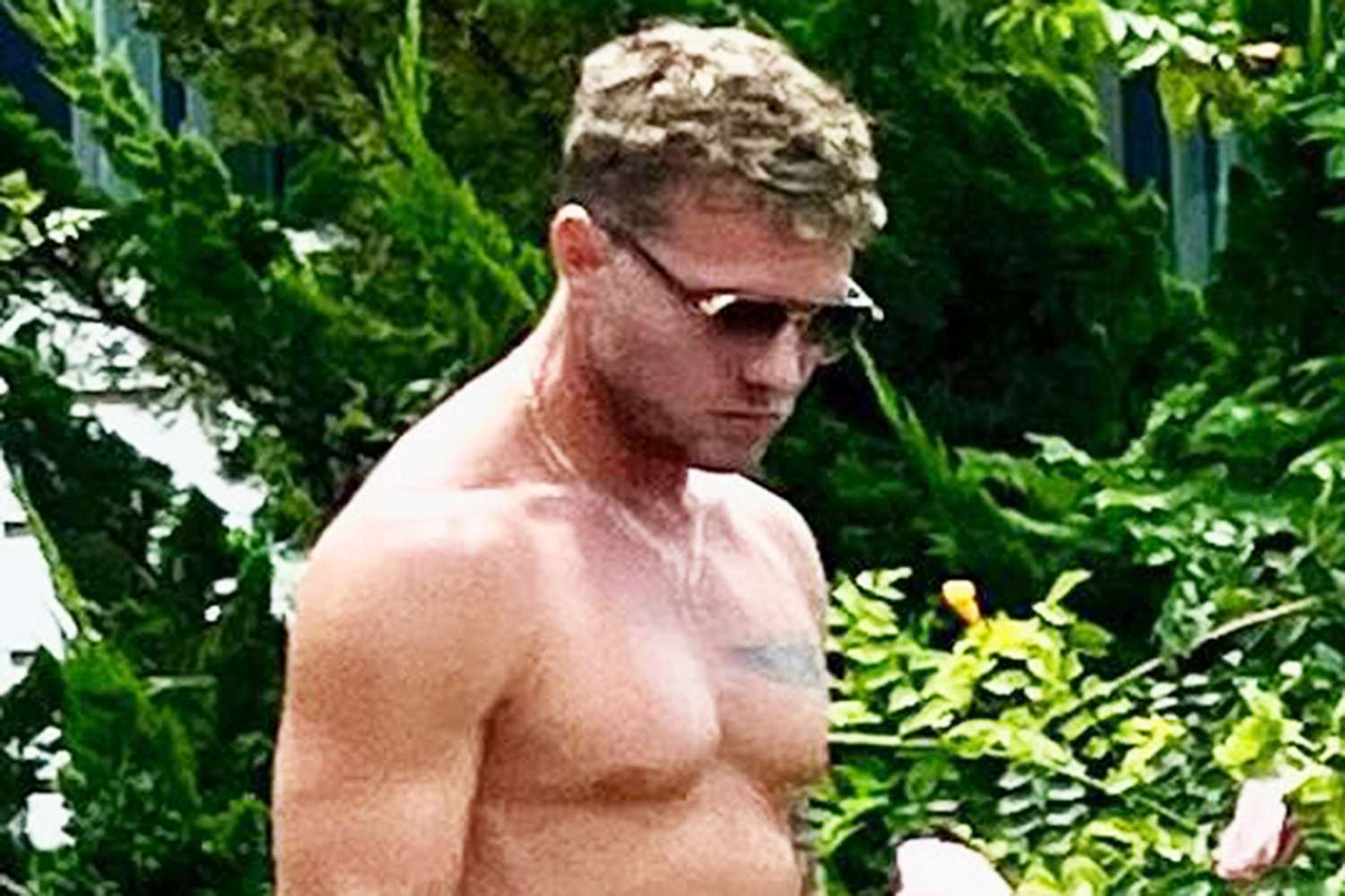 Ryan Phillippe Shares Shirtless Photo of Himself Admiring a Garden: 'My Hibiscus Mad Lovely'