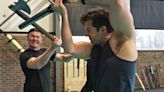 Watch Henry Cavill sweat it out behind the scenes of The Witcher Shaerrawedd one-shot