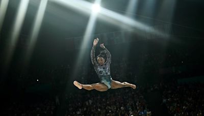 US gymnastics star Simone Biles dazzles in Paris Olympics opening beam routine