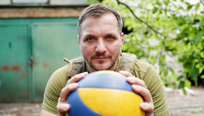 Ukrainian Paralympian practices his volleyball spike when he's not flying drones over Russian troops
