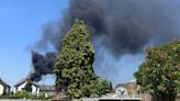 Large fire breaks out at tower block in Surrey town centre