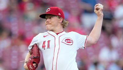 Hinds homers in big league debut and Abbott goes 7 innings as Reds blank Rockies 6-0