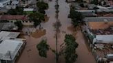 Flood-battered farmers in southern Brazil wade through lost harvests