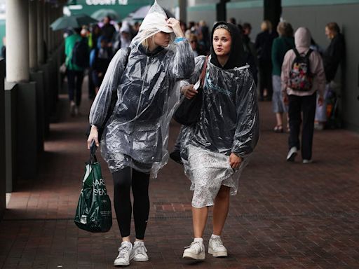 Rain stops play at Wimbledon and dampens spirits at Henley