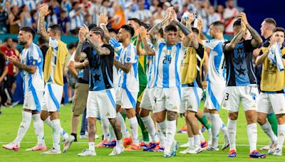 Messi sits, Martinez scores twice, Argentina beats Peru 2-0 to top Copa America Group A