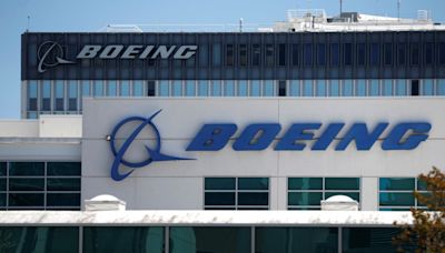Boeing shareholders vote to keep departing CEO on planemaker's board By Reuters