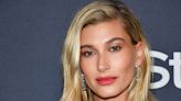 Hailey Bieber debuts bouncy beach curls in an itsy bitsy bikini