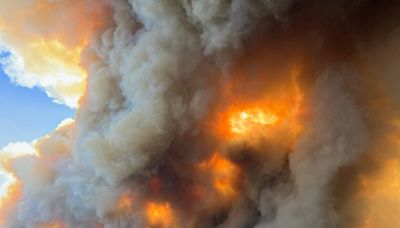 A thunderstorm over New Mexico wildfire could bring some relief