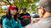 Suspect in Maga hat arrested after protester shot during demo against statue of conquistador in New Mexico