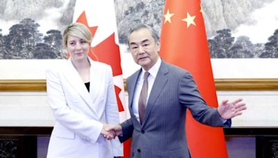 Canada, China pledge to mend relations after foreign affairs ministers meet in Beijing | CBC News