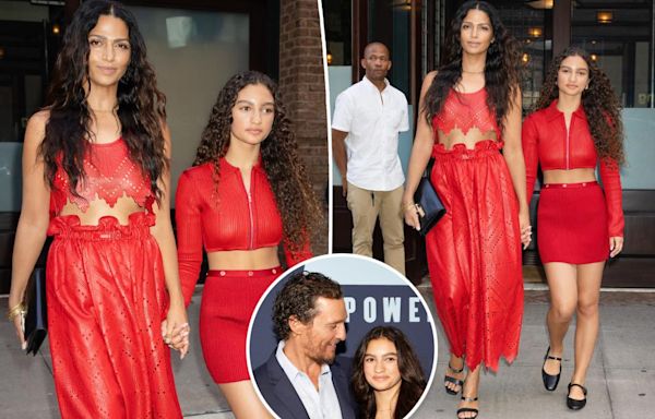 Matthew McConaughey’s wife Camila Alves and daughter Vida, 14, twin in red