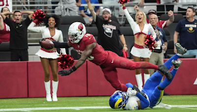 Rookie Marvin Harrison Jr. catches first 2 NFL touchdowns and Cardinals roll past Rams 41-10