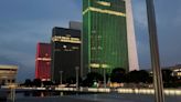 Buildings lit in different colors in honor of Juneteenth