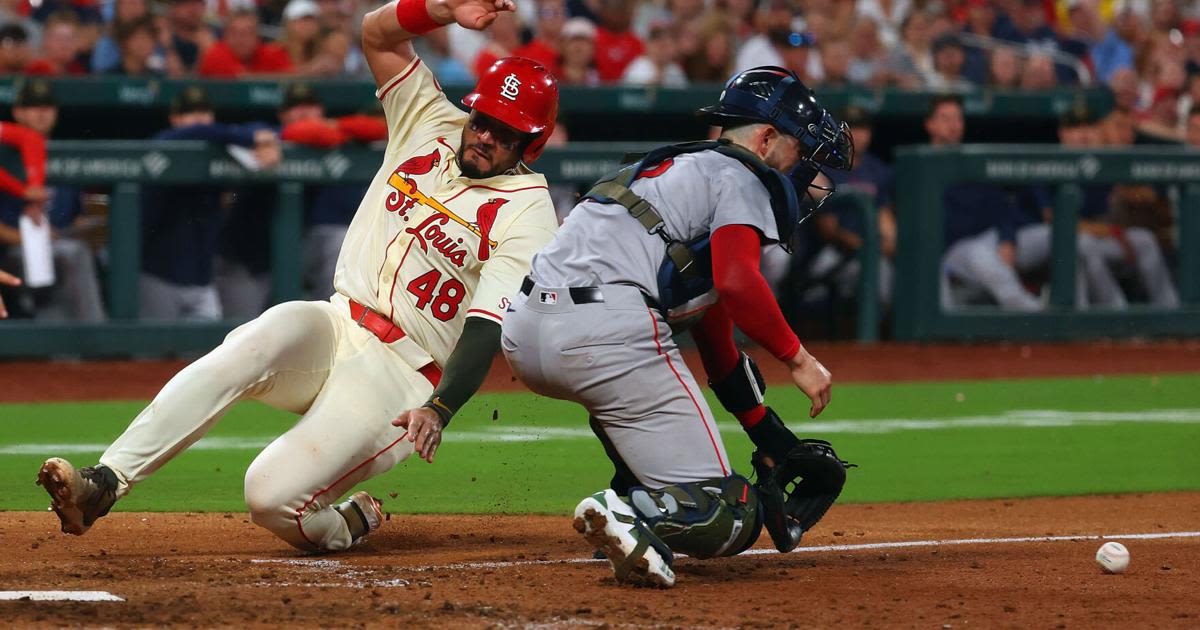 ...Cardinals' Ivan Herrera scores a run against the Boston Red Sox in the eighth inning at Busch Stadium on Saturday, May 18, 2024, in St. Louis, Missouri.