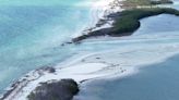 DRONE VIDEO: Honeymoon island splits in half due to erosion, sand migration