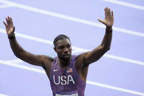 Noah Lyles has a gold medal around his neck and his eyes set on the stars