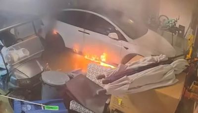 Tesla bursts into flames inside Florida garage flooded by Hurricane Helene, terrifying video surfaces: Watch