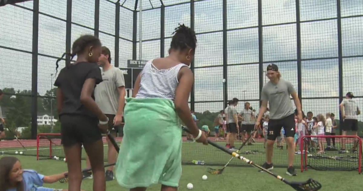 Penguins prospects participate in youth dek hockey clinic as part of development camp