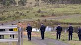 Divers search for bodies of Sydney couple allegedly shot dead by jilted police officer