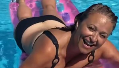 Nadia Sawalha praised for 'incredible' bikini vid as husband shares racy comment