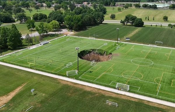 Sinkhole swallows soccer field in Illinois in shocking video