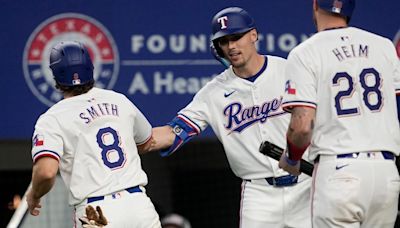 Angels beat Rangers 9-3 to give Ron Washington win in his 1st game as visiting manager in Texas