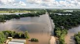 Millions swelter as temperatures soar across the US, while floodwaters inundate the Midwest