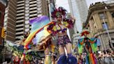 Thousands sing, dance and celebrate at Pride Parade until protesters strand marchers and floats mid-route