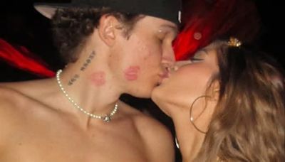 Charlie Sheen and Denise Richards' daughter Sami, 20, passionately kisses her shirtless OnlyFans boyfriend Aiden David, 23, at Coachella