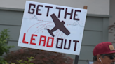 Long Beach neighbors rally against flight school's noise