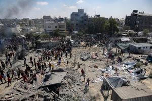 An Israeli attack targeting the Hamas military commander kills at least 71 in southern Gaza