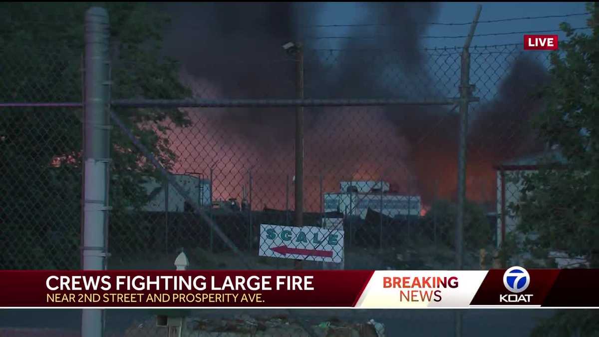 Large fire burning at southwest Albuquerque salvage yard