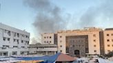 Three Gaza hospitals surrounded by Israeli tanks with blasts heard nearby