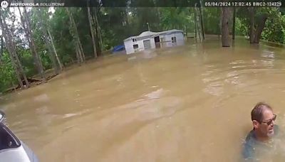 Video shows Houston police officer rescuing Texas man, 3 dogs from flooding along San Jacinto River