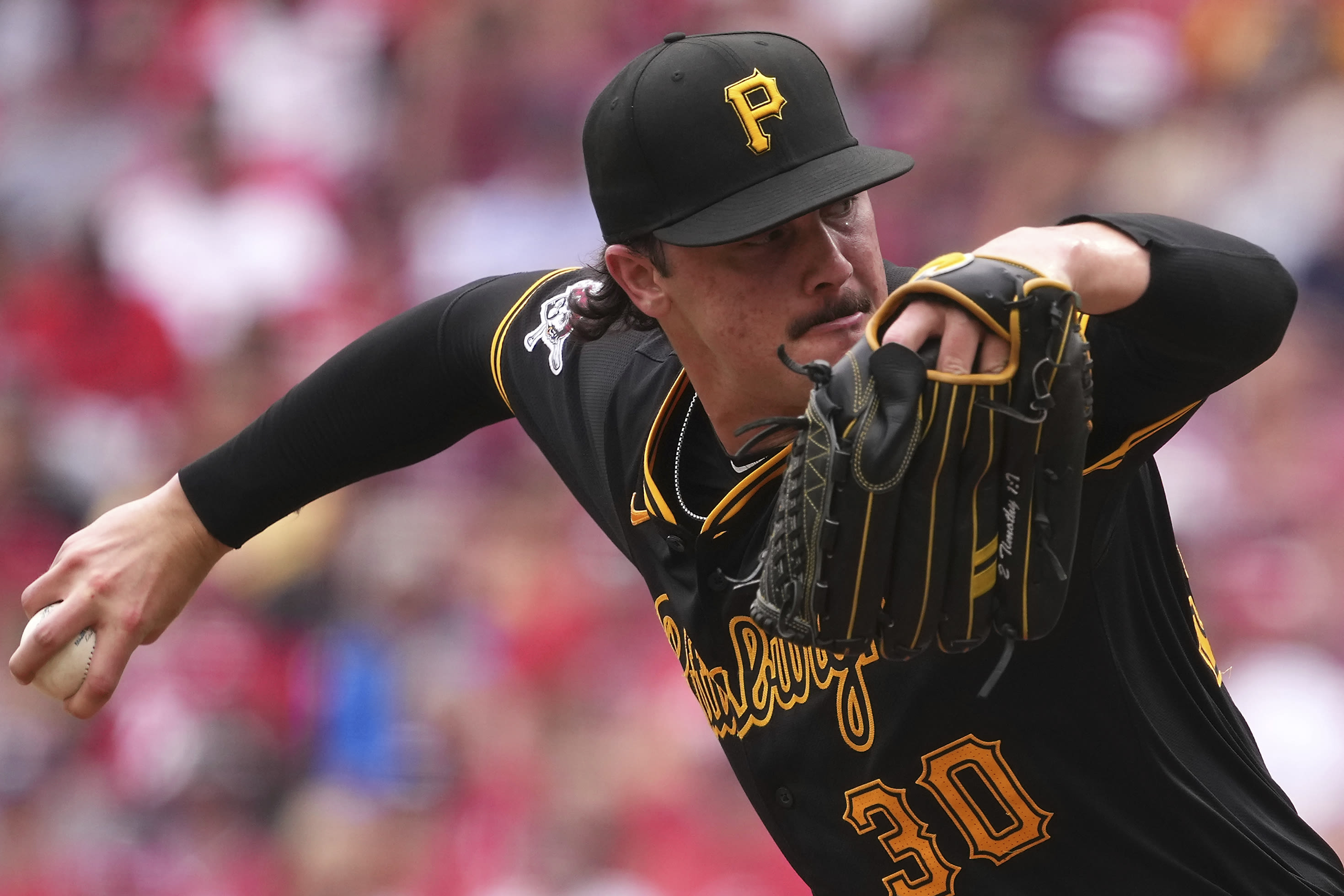 Paul Skenes strikes out 9 and pitches 2-hit ball through 5 innings as Pirates stop Reds 2-0