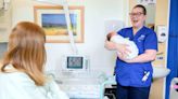 Millionaire midwife still delivering babies a decade on from lottery win