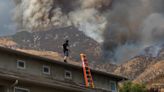 Residents flee as California and Nevada wildfires get dangerously close and forecasters warn of record heat