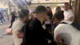 England fans throw punches at each other in huge street brawl