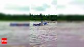 Two persons rescued from flooded Panam river on tractor-trolley | Vadodara News - Times of India