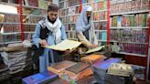 Phones, Islamic books and currency exchange. Some businesses are making money out of Taliban rule