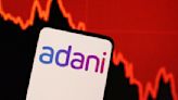 India markets regulator puts six Adani units on notice