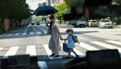 Japan's birth rate plummets to historic low for eighth consecutive year, prompting calls for action