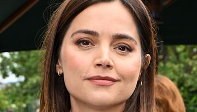 Jenna Coleman shows off her growing bump in a chic pink shirt dress
