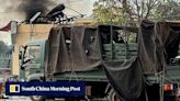 Cambodia says blazing heat a factor in army base blast that killed 20 troops