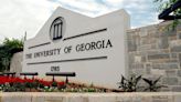 Police take a suspect into custody after killing of nursing student at University of Georgia