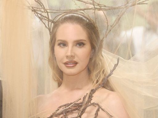 Lana Del Rey’s 2024 Met Gala Look Is Completely Sheer and Decked Out in Tree Branches