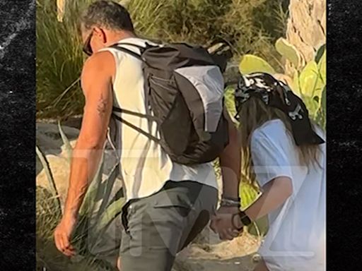 Mauricio Umansky Snuggles Up With Actress Nikita Kahn In Greece